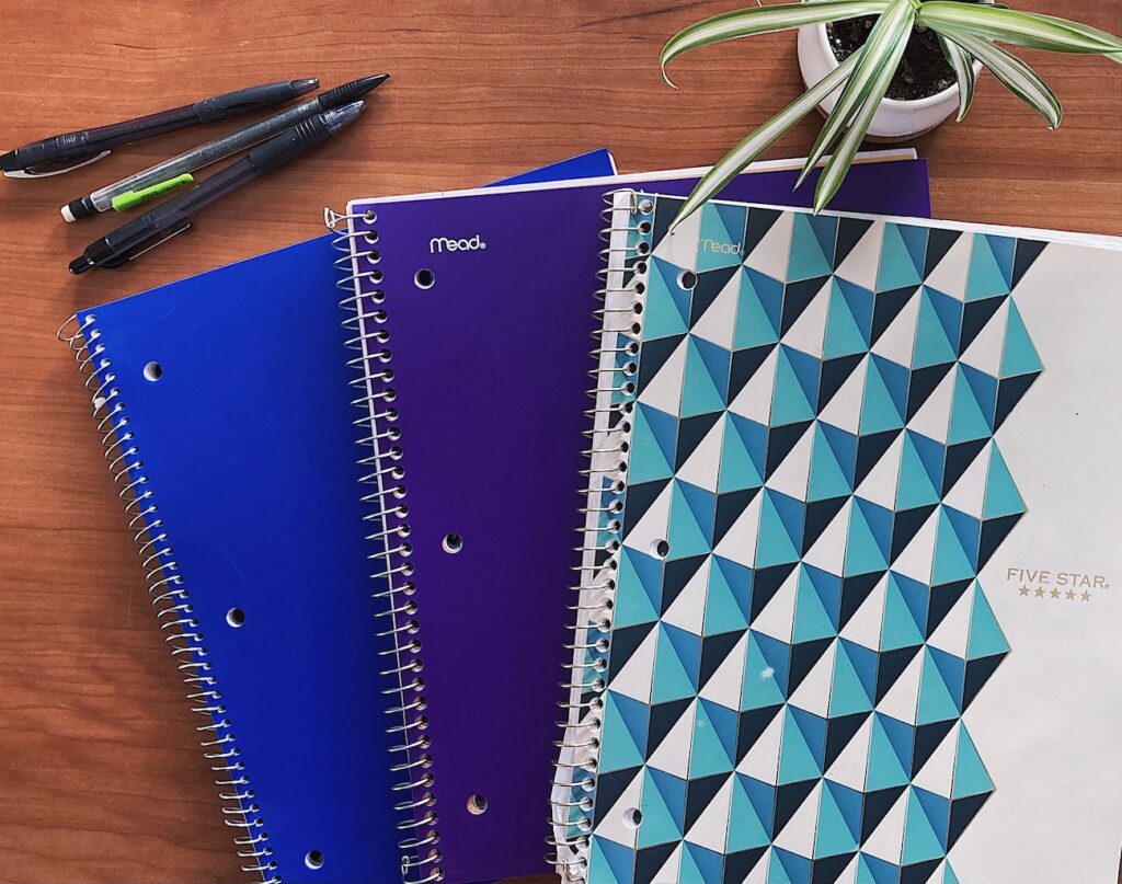 the simplest weekly planning strategy spiral notebooks on table