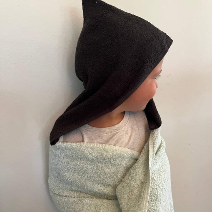 little boy wearing homemade hooded towel