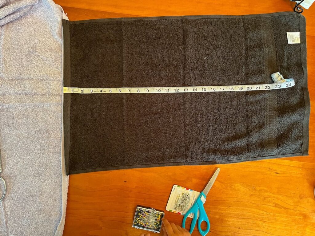 measuring 14" from the edge of the hand towel