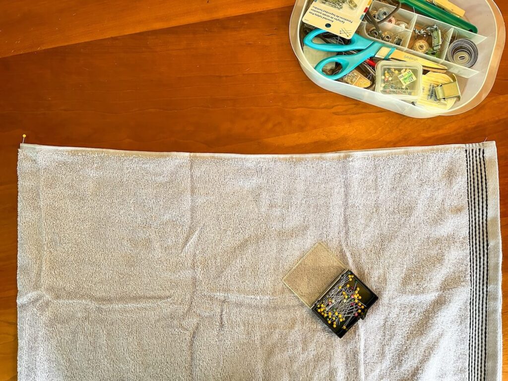 finding middle of towel with a pin