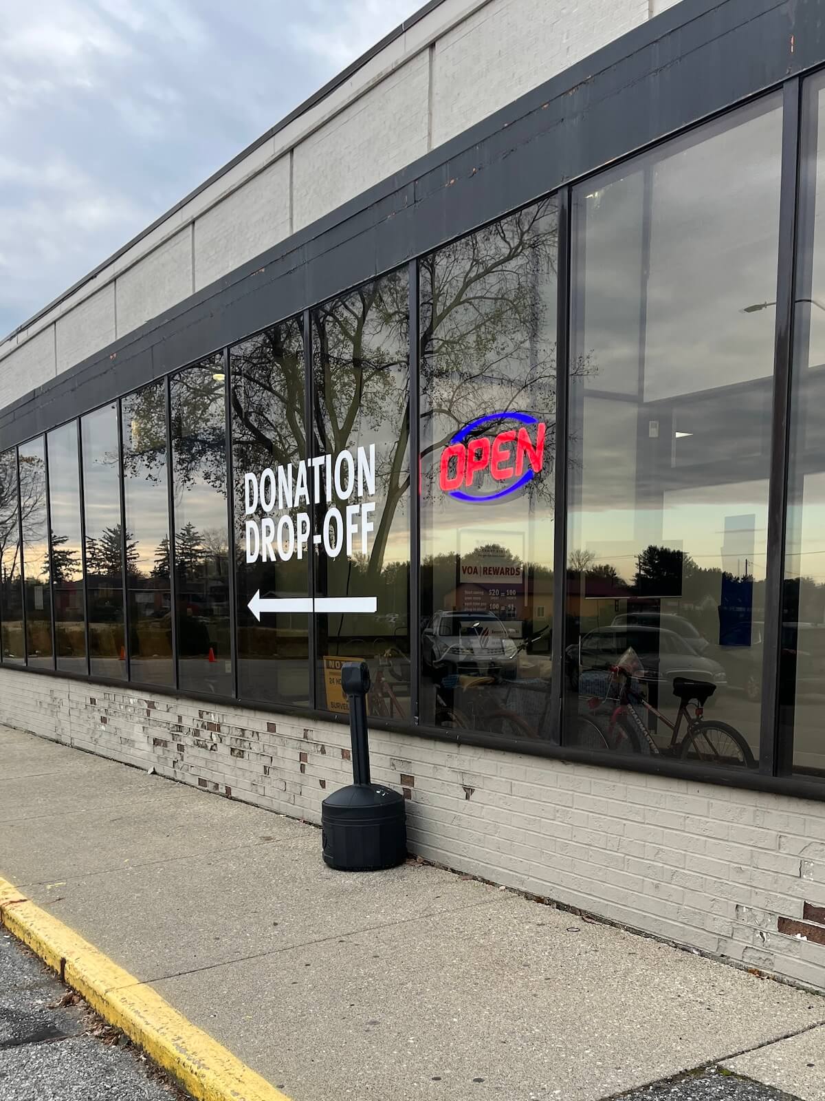 donations sign on storefront window