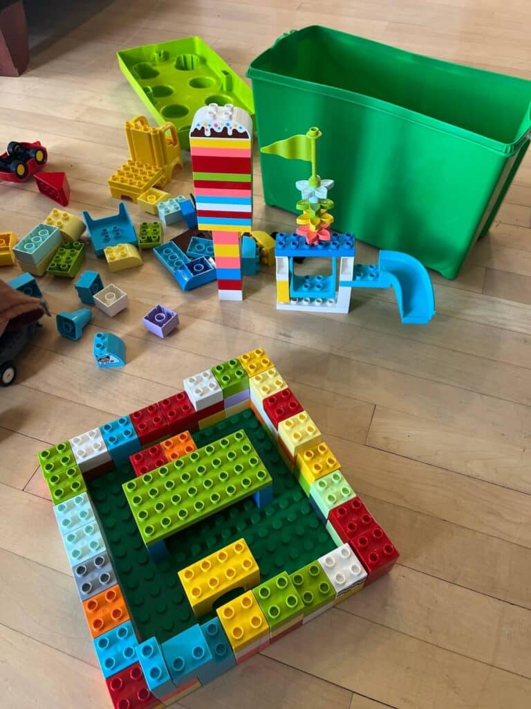 duplo creation on wood floor