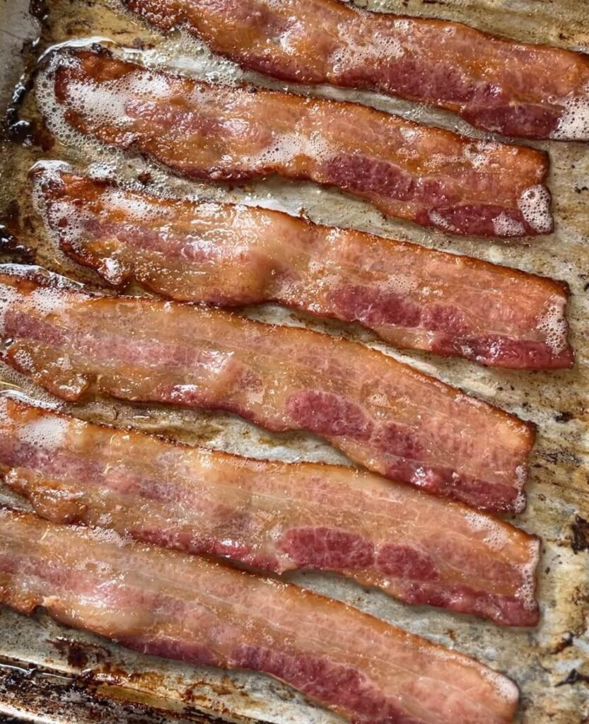 crispy cooked bacon on parchment paper