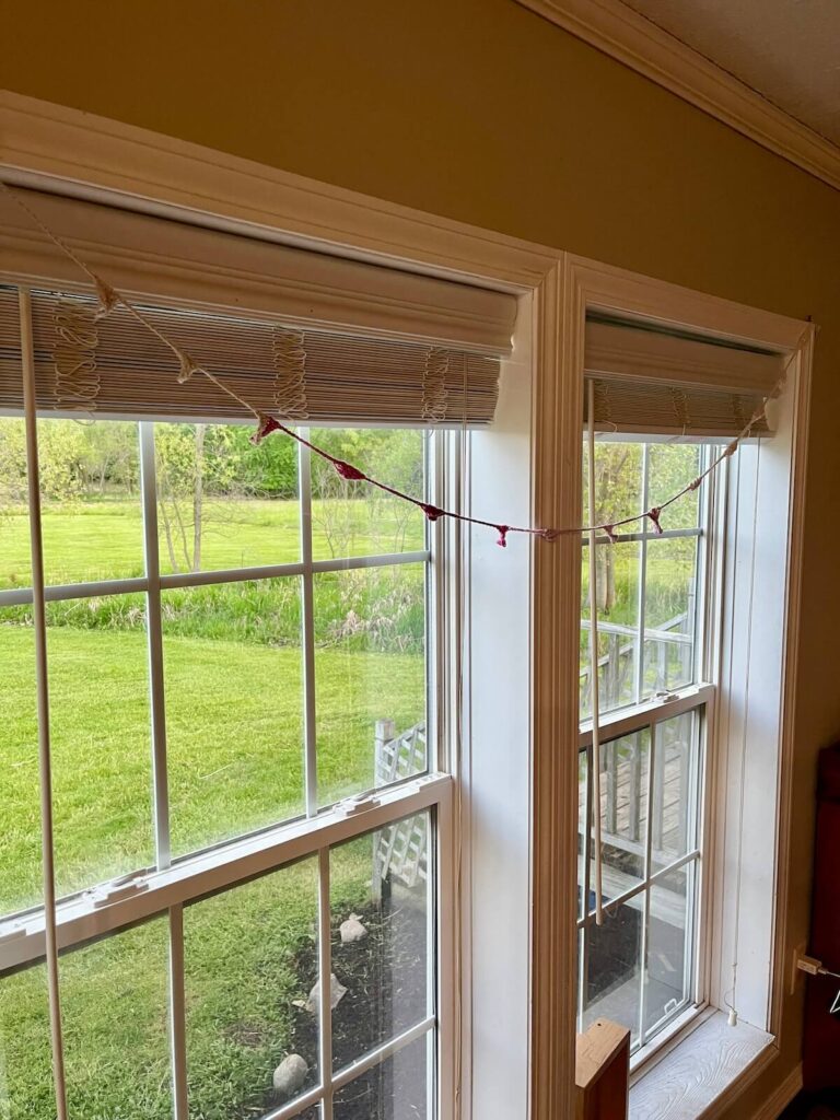 simple crochet garland across windowsill